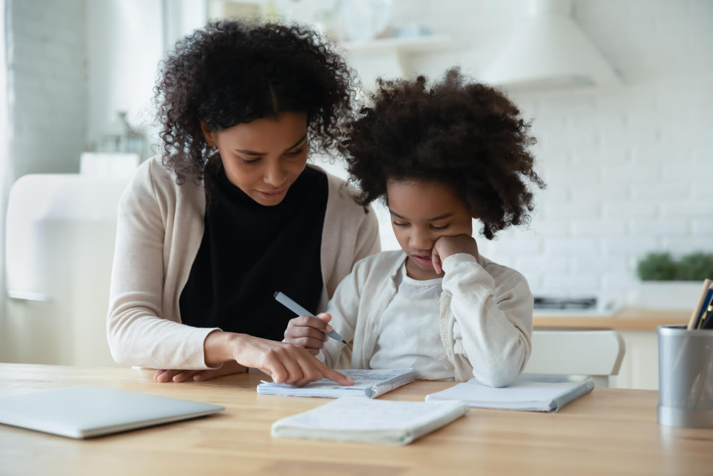 Mum homeschooling child during lockdown